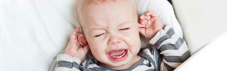 Upale ušiju kod dece – simptomi i lečenje